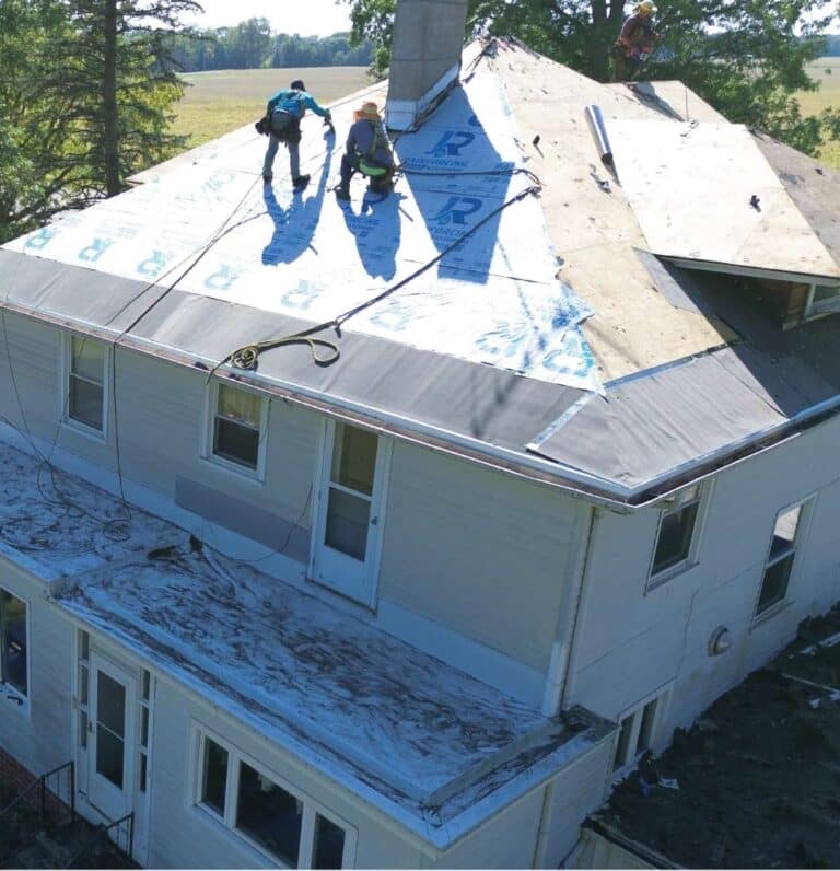 Miguel Rivera 11 A pristine, newly installed roof featuring code-compliant flashing and ridge vents for maximum protection.