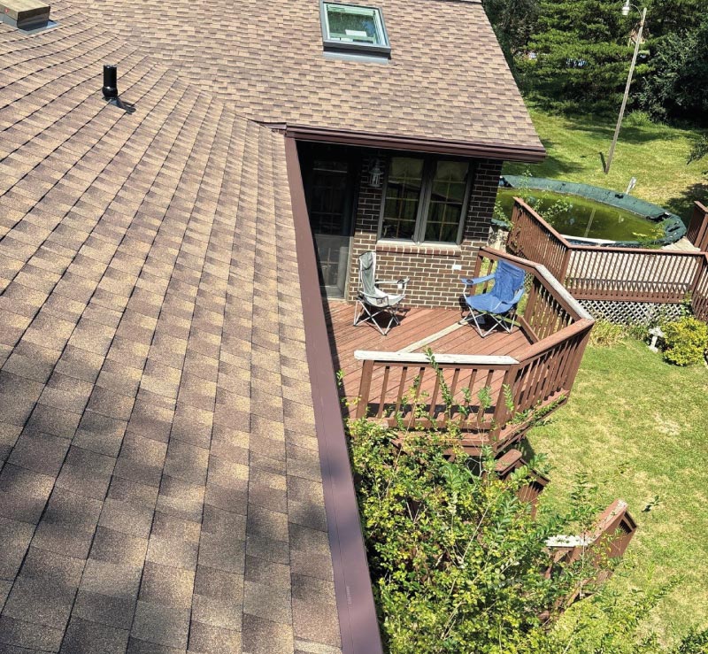 new roofing with gutter system